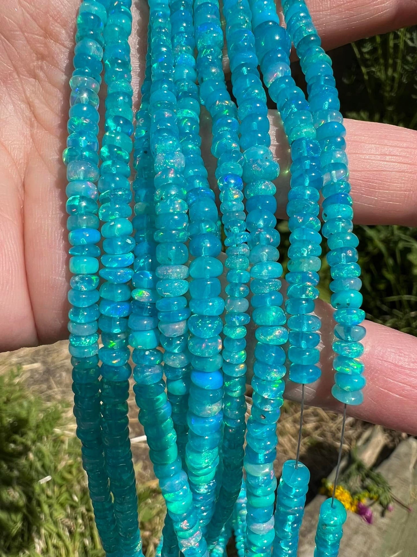 New and wondrous Aqua blue Ethiopian Opals 3mm approx