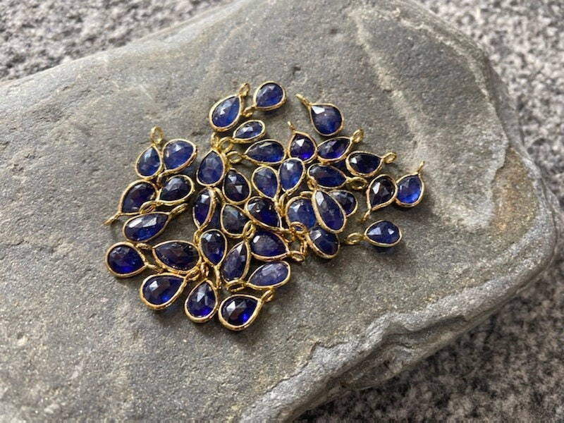 Pure Burmese Sapphire in a gold plated bail 12mm approx handmade rustic