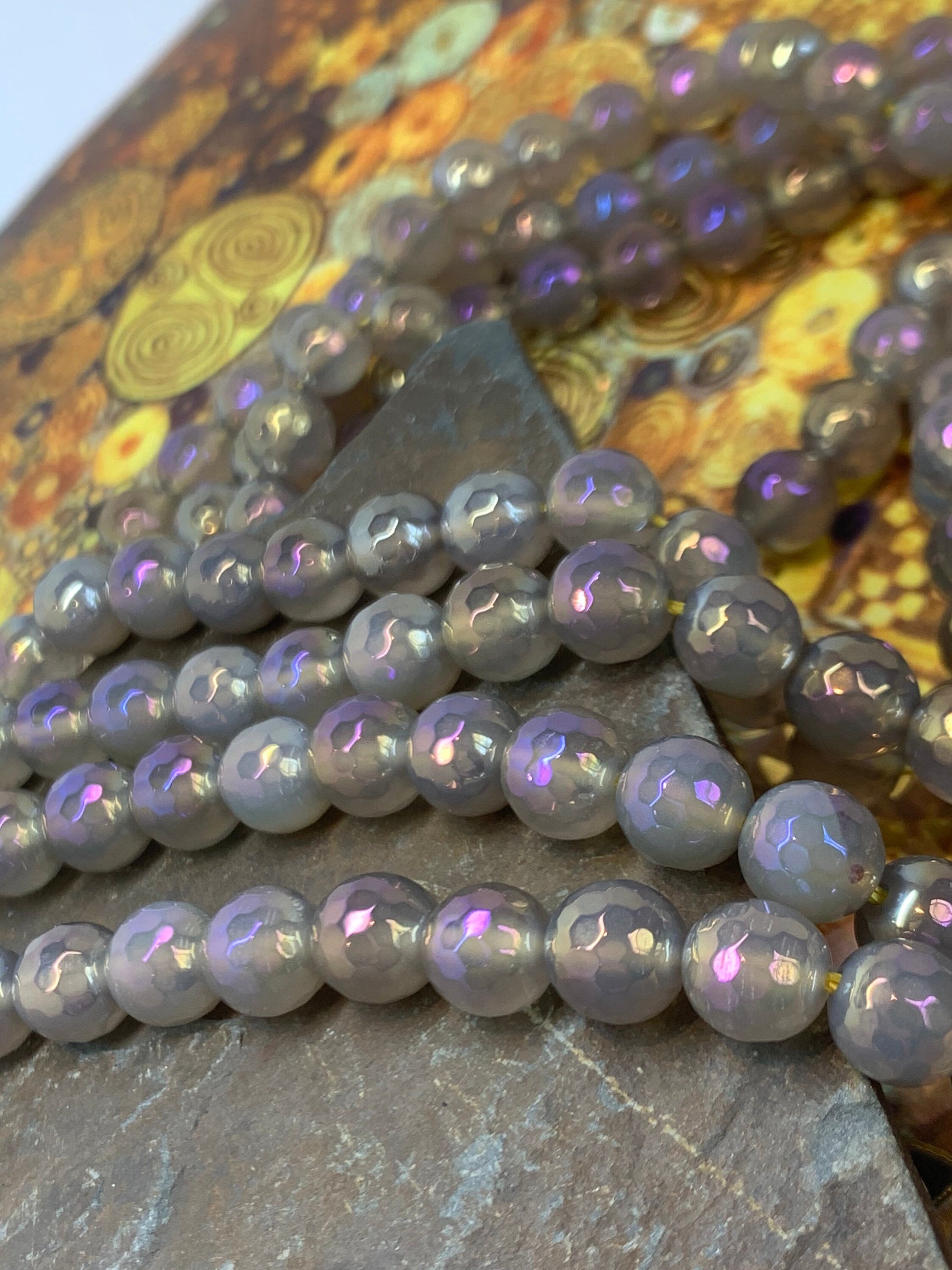Amazing Purple Pink Gold rainbow Titanium plated faceted Agate beads. 8mm