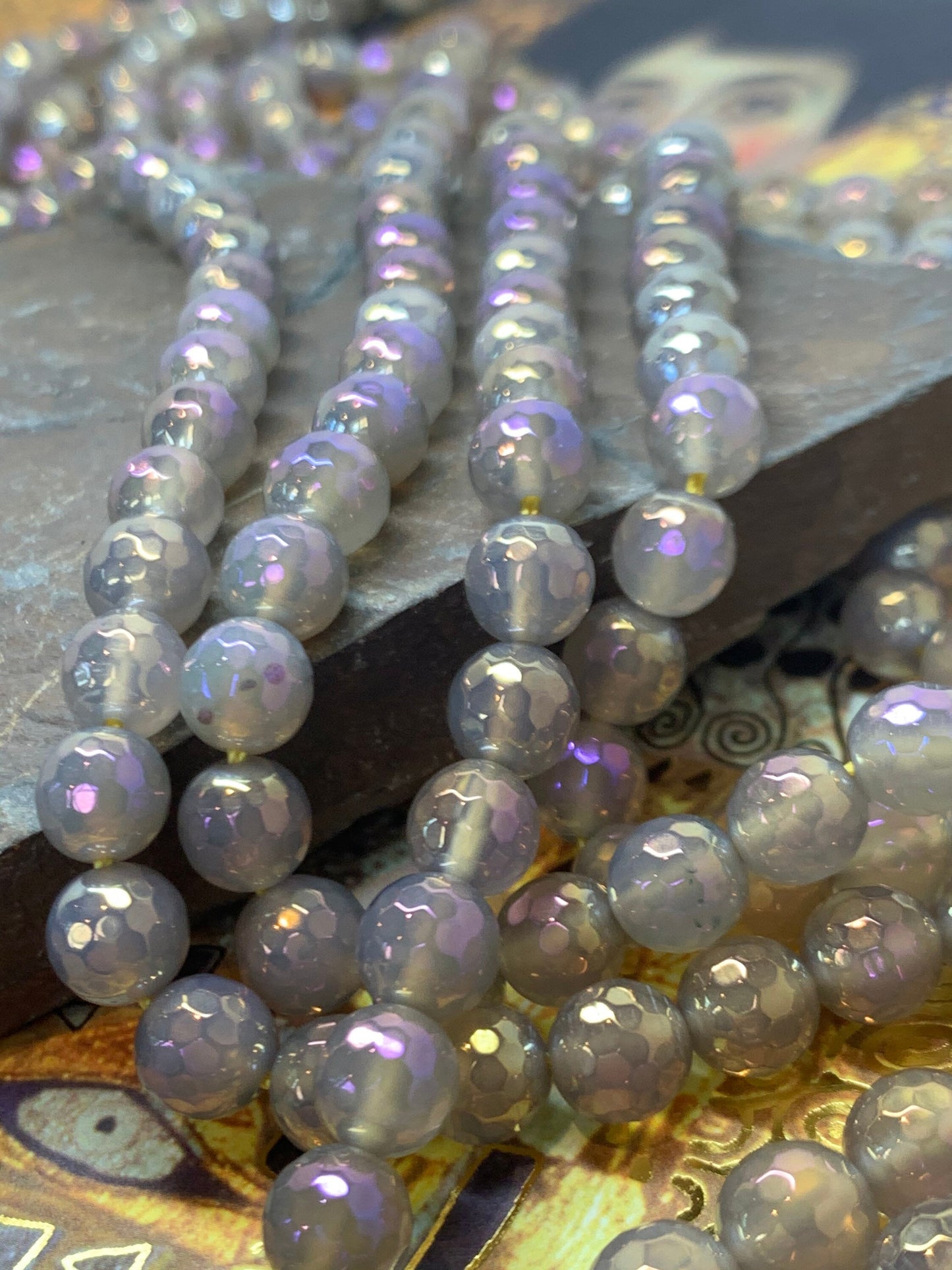 Amazing Purple Pink Gold rainbow Titanium plated faceted Agate beads. 8mm