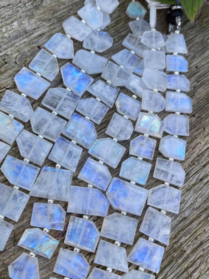 Incredible high quality step faceted slabs of pure flashy Blue Rainbow Moonstone. 9-13mm 18 bead strand Blue flash Moonstone