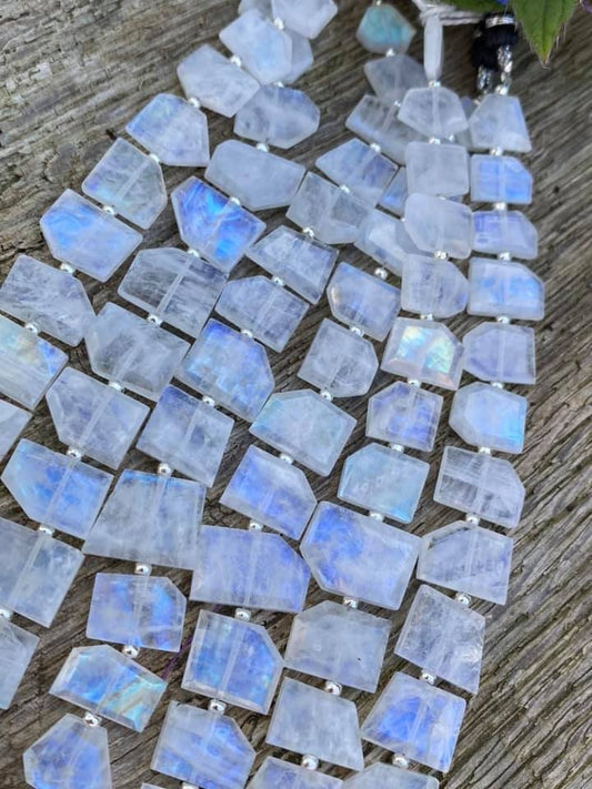 Incredible high quality step faceted slabs of pure flashy Blue Rainbow Moonstone. 9-13mm 18 bead strand Blue flash Moonstone
