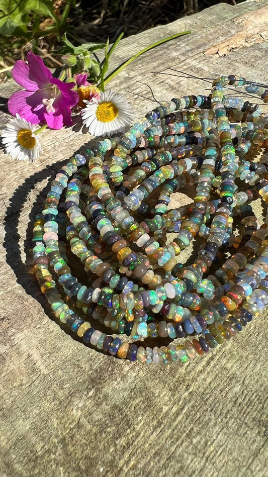 Prettiest natural Ethiopian Earth Opal Rondelles 3mm/ spectrum of soft fiery oranges, blue, brown, green, gold