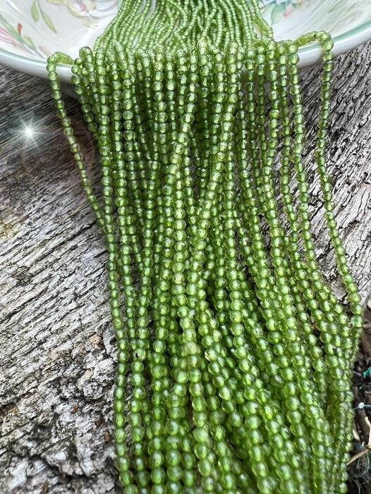 Deliciously vibrant natural faceted Peridot tinies / 2mm