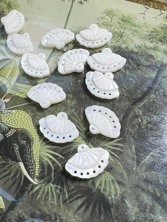 SOLD per bead / Shimmering Carved Mother of Pearl fans with connector holes. 20mm